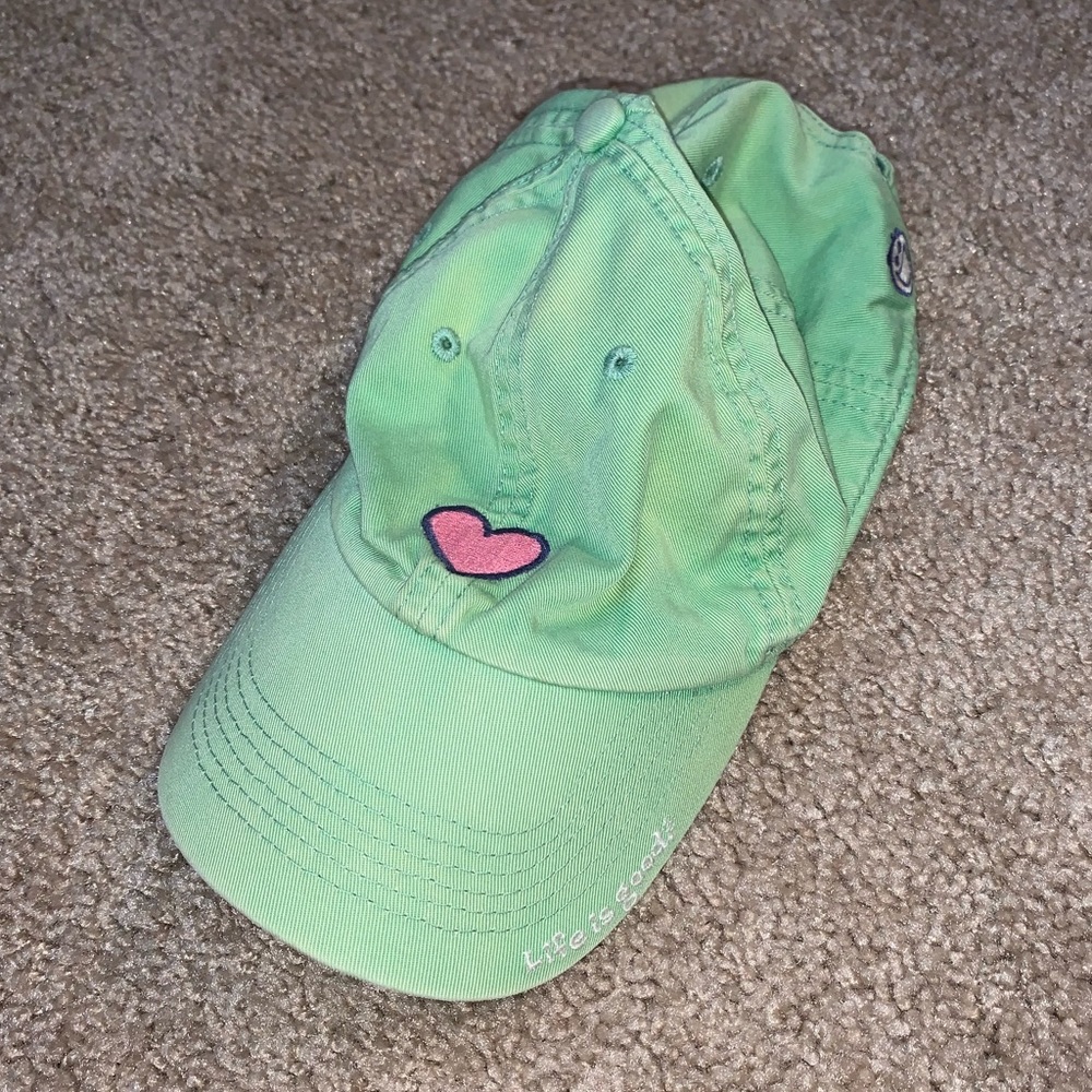 Life is good hat with pink heart on front.